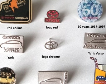 Choose one of our exclusive Toyota logo pins to complete your look
