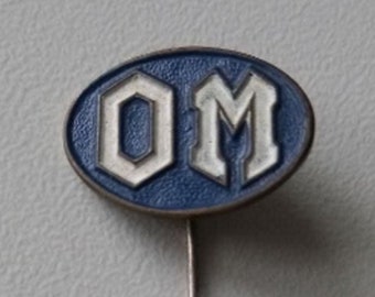 Vintage chic with OM pin