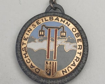 Alpine View and National Emblem – Enamel Keychain Dachstein & Austrian Eagle