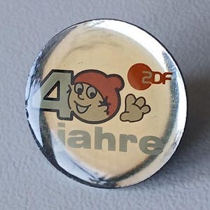 Exclusive ZDF Mainzelmännchen Anniversary Pin – Limited Edition