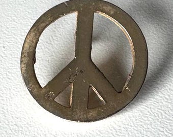 Golden peace symbol pin – rare 1980s collector piece