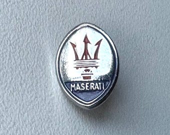 Maserati logo enamel pin – 1980s Bertoni Milano original automotive collectible