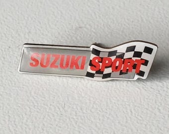 SUZUKI Checkered Badge – Classic Black & White Racing Flair!