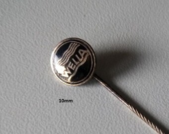 WELLA Logo Pin - A testament to hairdressing history