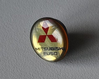 Mitsubishi Fuso Logo Pin – A Piece of Automotive History from 2004