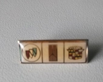 Get this rare treasure! Buick, Oldsmobile, Cadillac dealer pin