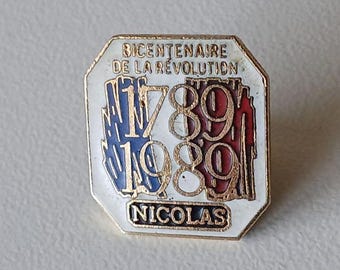 Nicolas Anniversary Pin – A Piece of Revolution