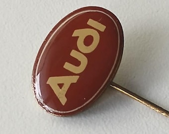 Original Audi Pin with Brown Logo – Classic Brand Badge for Collectors