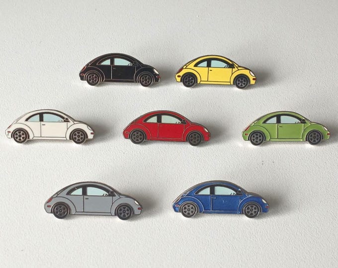Featured listing image: VW New Beetle Motif Pin – colorful collectible from the design revolution of the 1990s
