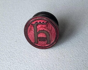 Hirschmann logo screw button – rare tech motif with enamel patina