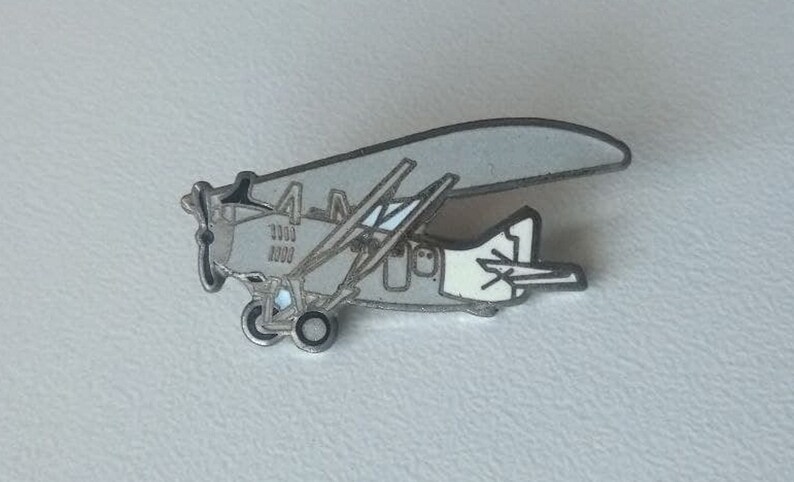 LATECOERE aircraft motif monoplane strutted l/'A\u00e9ropostale pin badge enamelled gray 1990s