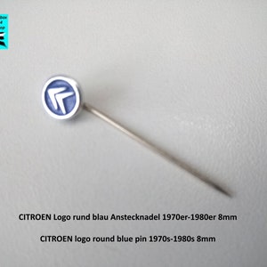 May include: A blue and silver round pin with the Citro&euml;n logo. The pin is 8 mm in diameter and dates back to the 1970s-1980s.