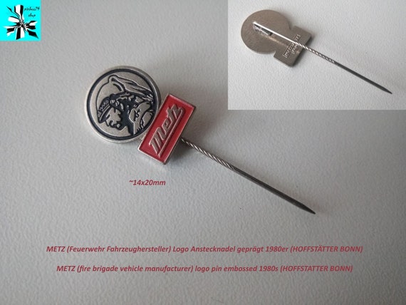 METZ (fire brigade vehicle manufacturer) logo pin embossed 1980s (HOFFSTATTER BONN)