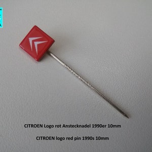 May include: Red enamel pin with a white Citroen logo. The pin is 10mm in size and is on a silver pin back.