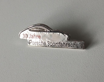 Silver Legacy – Porsche Pin Featuring Iconic 911 Silhouette