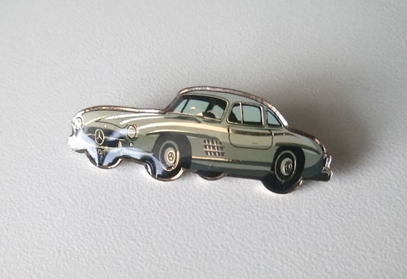 Experience the history of Mercedes-Benz on your lapel… - Gem