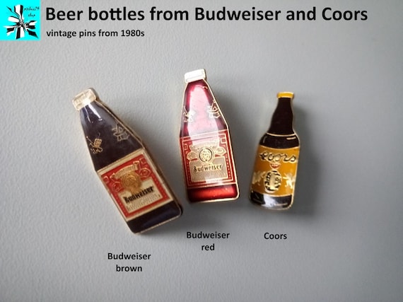 Beer bottle pins from Budweiser and Coors, 1980s