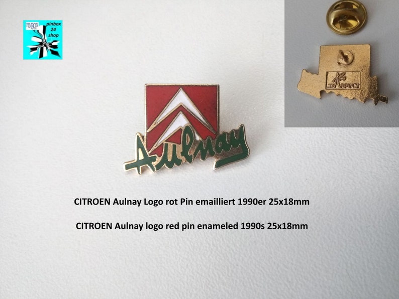 May include: Red and green enamel pin with the text "Aulnay" and the Citroen logo. The pin is 25mm by 18mm.