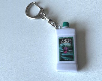 Amway 3D bottle keychain – rare branded plastic collectible