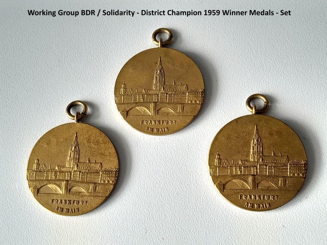 Vincitori d'oro: set di medaglie artistiche per il ciclismo