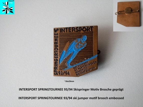 INTERSPORT SPRINGTOURNEE 93/94 ski jumper motif brooch embossed