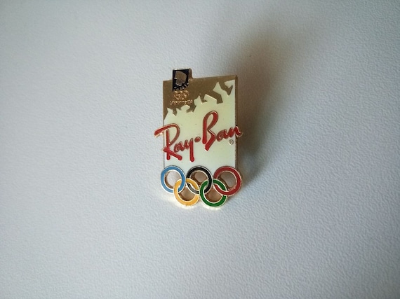 Ray-Ban: The sponsor pin with the Olympic logo (Lillehammer 1994)
