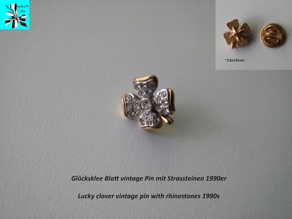 A sparkling lucky charm: a vintage pin with a cloverleaf made of rhinestones from the 90s