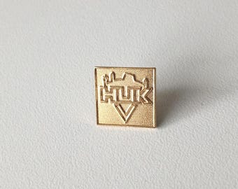 HUK Logo Lapel Badge – Vintage Collector’s Item from the 1990s