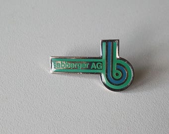 Babberger AG Logo Pin – A Touch of Industrial Elegance!