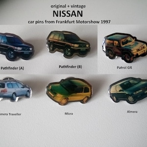 NISSAN IAA 1997 Promo Pins - A Must for Collectors!