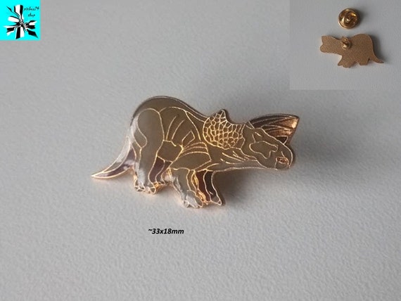 Dinosaur pin brown