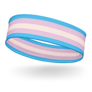 Könnte beinhalten: Ein blaues, rosa und weiß gestreiftes Stirnband. Das Stirnband ist aus weichem, dehnbarem Material und perfekt, um die Haare aus dem Gesicht zu halten.