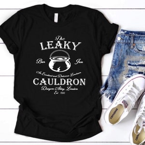 Leaky Cauldron, Wizard Shop, Wizard Shirt, Wizard world shirt, book reading magic shirt, bookish shirt, family vacation Black