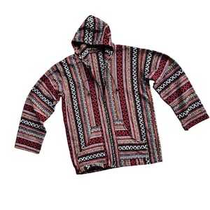 May include: A patterned hooded jacket in red, black, white, and tan. The design features vertical stripes and geometric shapes. The jacket has a front zip and two pockets. The style is reminiscent of a traditional design.