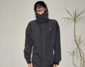 Vintage svart Kappa-jacka, dubbelfodrad, vindtät, vattentät, storlek oversized XL/2XL herr