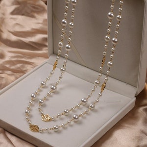 CHANEL Pearl Choker with gold-plated Sun Clasp - vintage – Loubi