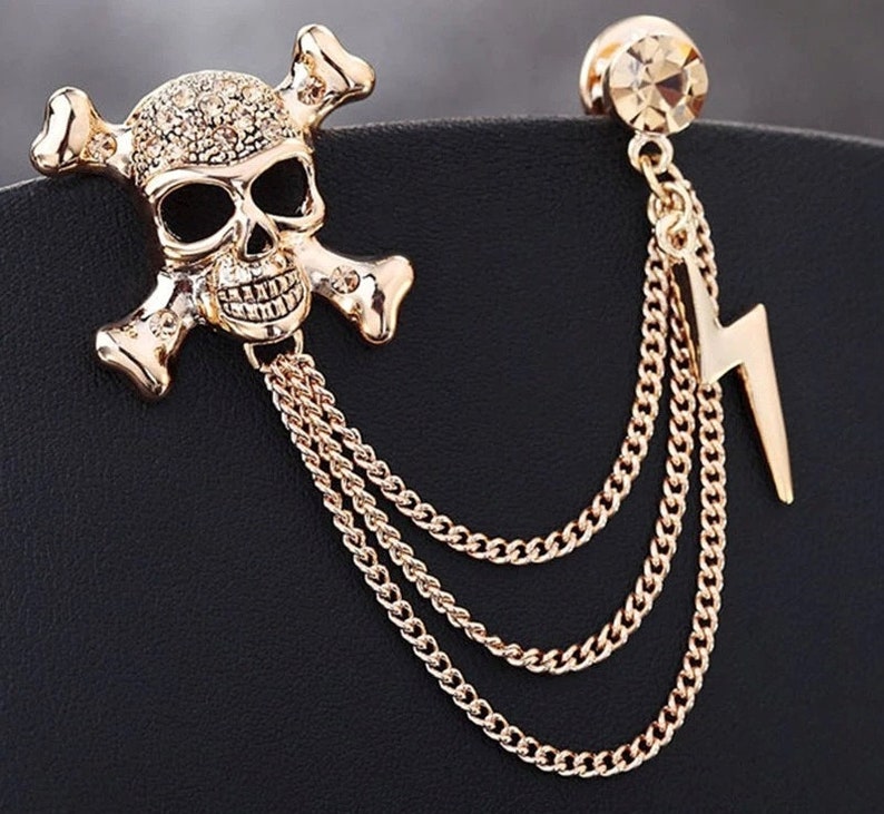 thumbnail image 2 of Skull & Lightning Bolt Unisex Jacket Brooch – Rhinestone Accent Pin With Chain (Alloy) 2 of 5