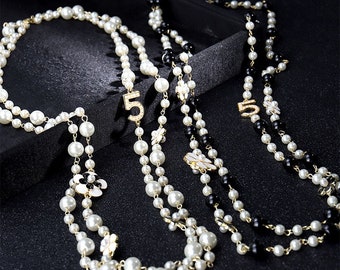 Chanel CC A12C SHW 3 Strand Pearl Crystal Logo Camellia Necklace