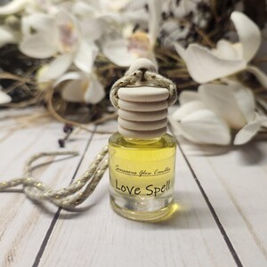 Love Spell Scented Hanging Car Diffuser, Auto and Home Air Freshener