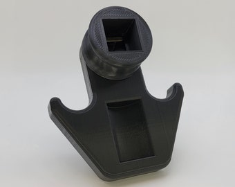 May include: Black plastic 3D printed hook with a square hole in the top and two hooks on the bottom.
