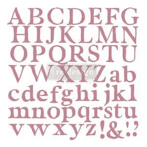 May include: A pink alphabet stencil with uppercase and lowercase letters, numbers, and punctuation marks. The stencil is on a white background.