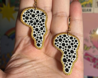 Polka dots melting ovals clay earrings