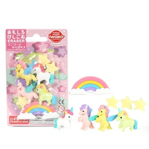 Könnte beinhalten: Eine Sammlung bunter Einhorn- und Pegasus-Radiergummis sowie stern- und regenbogenförmige Radiergummis. Die Radiergummis sind in einer rosa Blisterverpackung mit japanischem Text und dem Markennamen "iwako" verpackt.