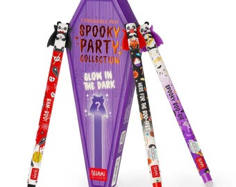 May include: Three erasable pens with panda-themed toppers stand before a purple coffin-shaped box labelled Spooky Party Collection and Glow in the Dark. The pens feature colourful Halloween-themed patterns, including pumpkins, ghosts, and text like Bam-Boo, Here for the Boo-ffet, and Spooky Boo-gie.