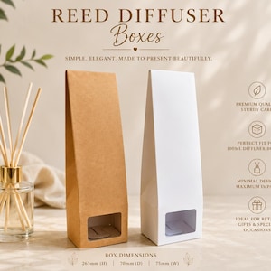 May include: Two tall, rectangular reed diffuser boxes, one in brown kraft paper and one in white, each featuring a rectangular cutout window at the base. Text includes REED DIFFUSER BOXES, SIMPLE, ELEGANT, MADE TO PRESENT BEAUTIFULLY, and dimensions 263mm (H) | 70mm (D) | 75mm (W).