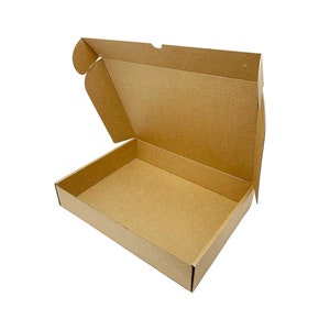 Royal Mail small parcel compliant postal box, 
Kraft E-flute corrugated cardboard postal box