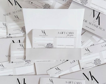 Vales regalo personalizados con carteras a juego de la marca: Sobre laminado brillante.