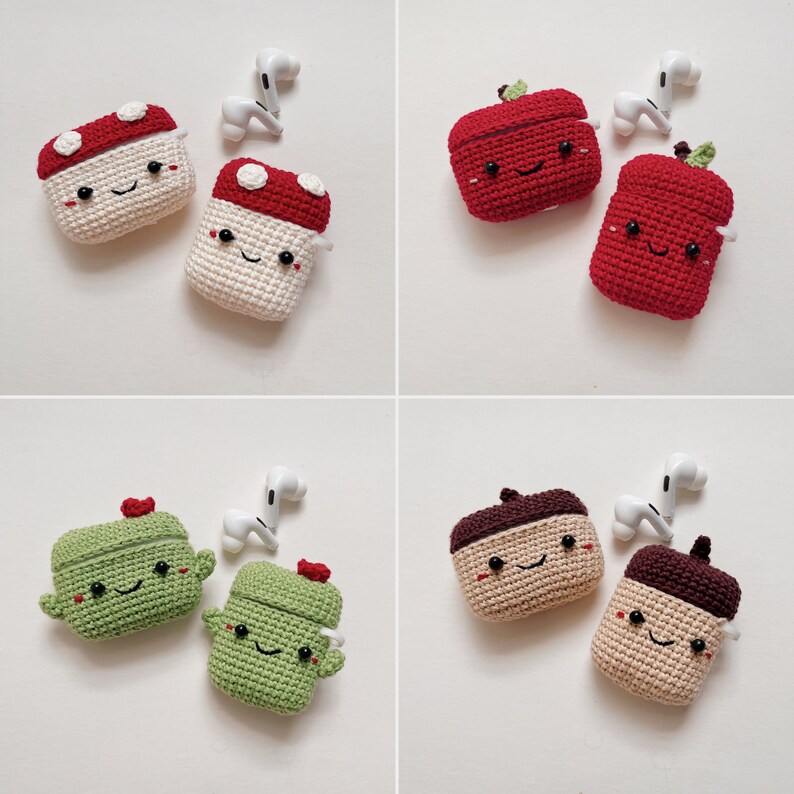 May include: Four crocheted AirPod cases in different designs. The cases are shaped like a mushroom, apple, cactus, and acorn. Each case has a cute face with embroidered eyes and a mouth.