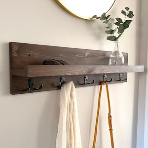 Coat rack with key holder store