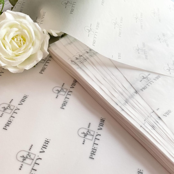 100 Branded packaging sheets for wrapping or display. Repeat logo print, multiple sizes.